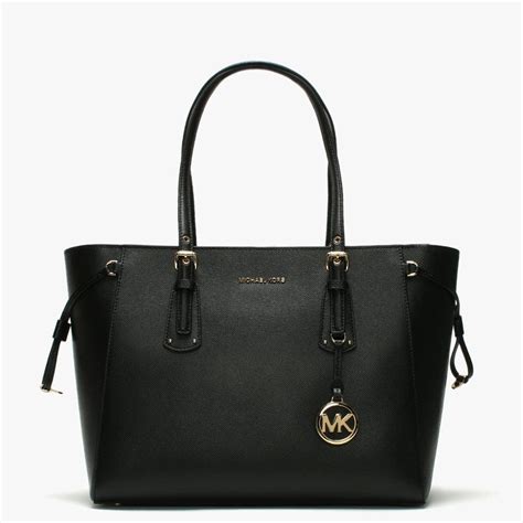 michael kors black and white bag price|michael kors hand bag price.